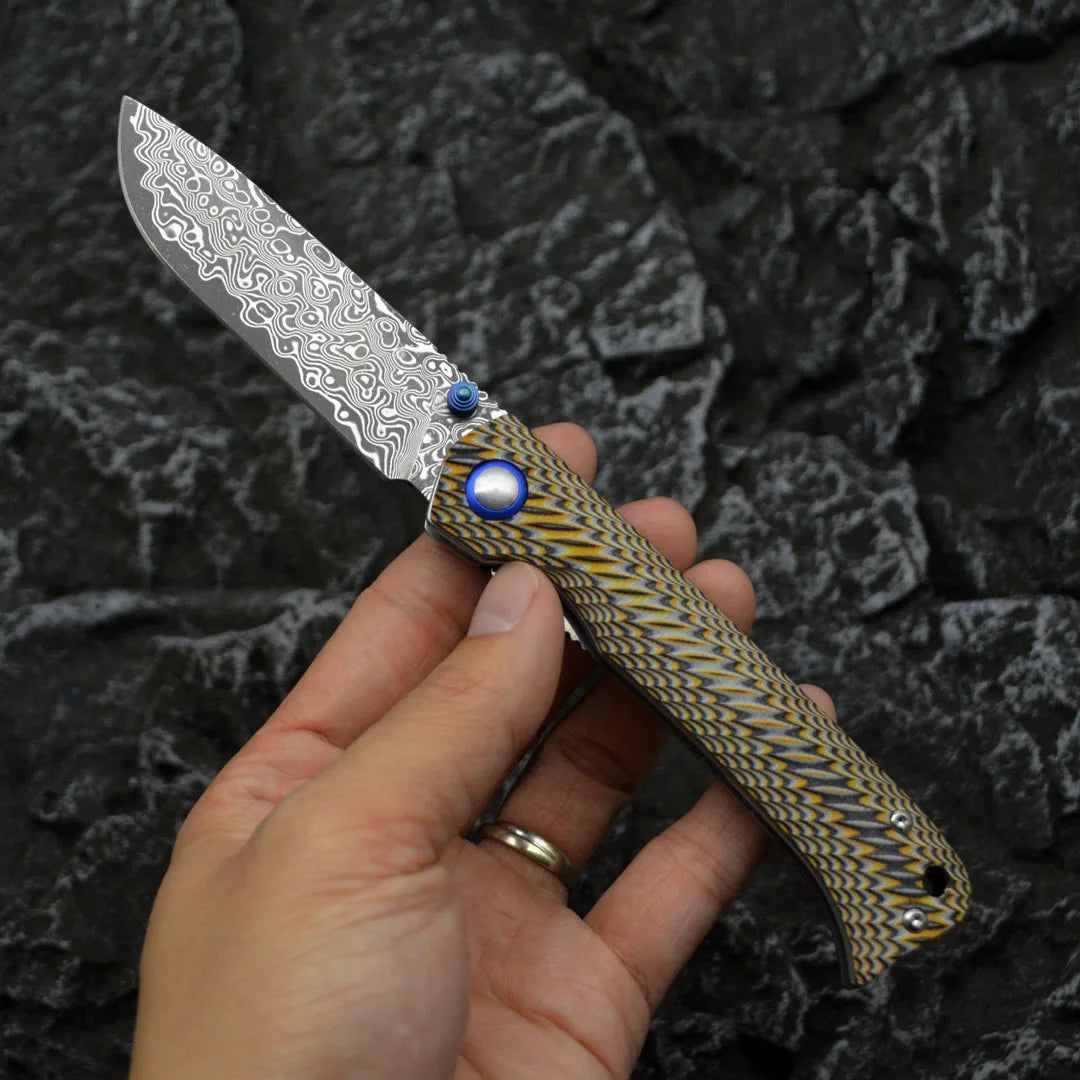 Winged Avian Damascus Folding Knife | G10 Handle & Zirconium Inlay | 59HRC